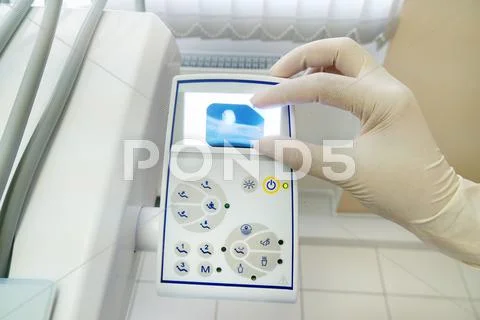 Dentist hand holding x-ray image of this tooth Stock Photos
