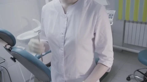 Dentist holding a device for operation close up Stock Footage 64285912