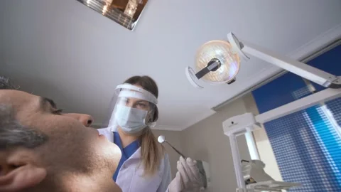 Dentist informs patient. Stock Footage 204042257