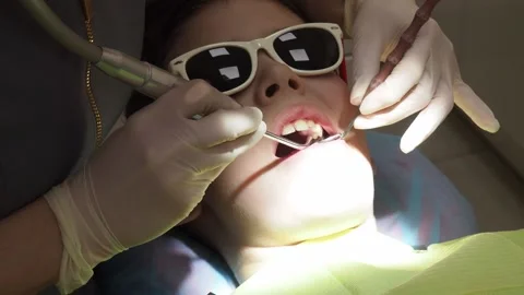 Dentist inspecting checked a child's teeth Stock-Footage 158446976