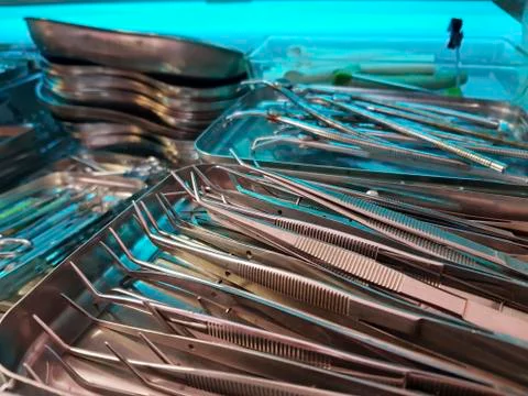 Dentist instruments under sterilization light Stock Photos