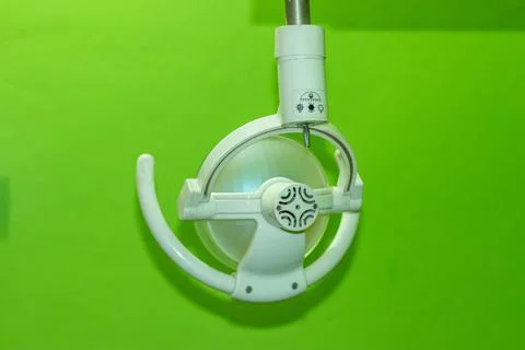 Dentist light has an adjustable bracket so you can position a variety if need Stock Photos