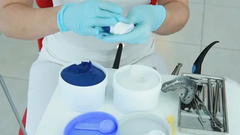 Dentist makes a cast of teeth for prosthetics Stock Footage 100534796