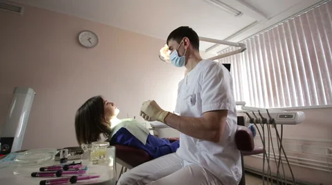 Dentist makes a mold of teeth Stock Footage 61851558