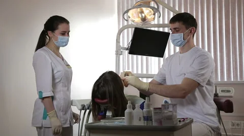 Dentist makes a mold of teeth Stock Footage 61851903