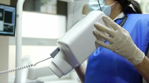 Dentist makes a X-ray of a young woman Stock-Footage 66692905