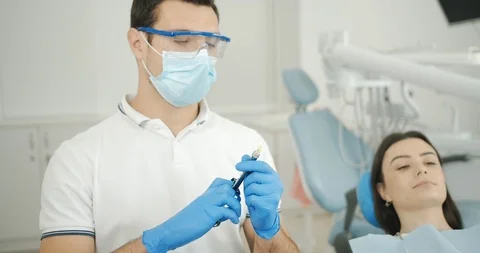 Dentist Making Anesthesia to Patient 動画素材 119333532