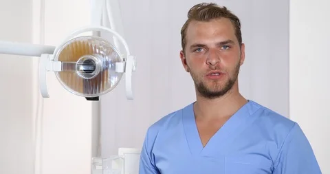 Dentist Man Portrait Talking Looking Camera Dental Clinic Presentation Concept Stock Footage 87948510