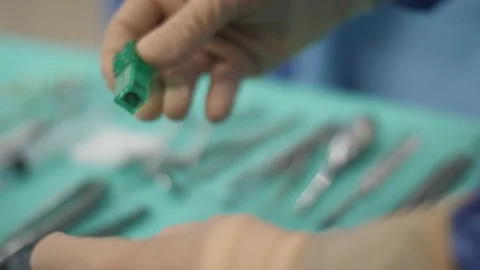 Dentist Opens Secured Box with Tooth Implant Stock Footage 148491747