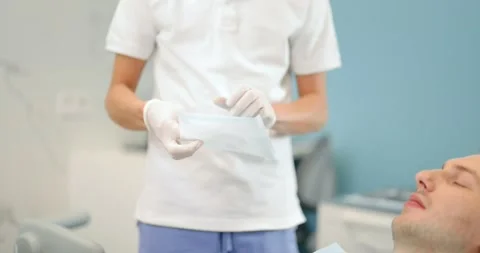 Dentist preparing for the dental checkup Stock Footage 147879369