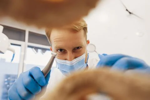 Dentist preparing to procedure with dental tools Stock Photos
