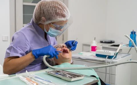 Dentist in the process. Stock Photos