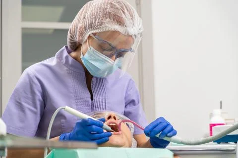 Dentist in the process. Stock Photos