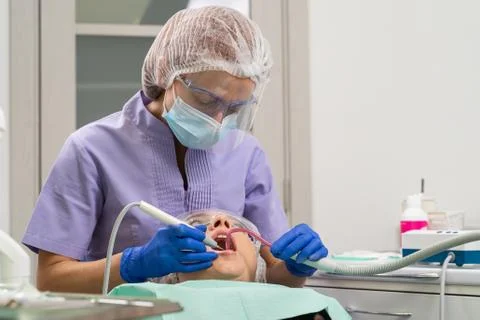 Dentist in the process. Stock Photos