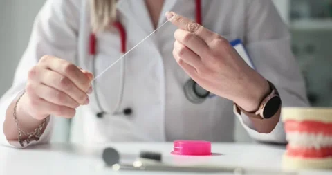 Dentist rules to use dental floss Stock Footage 281093982