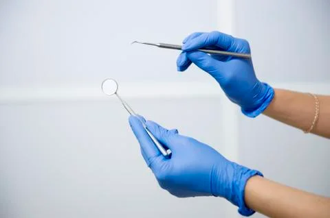 Dentist showing tools Stock Photos