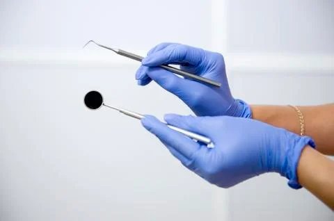 Dentist showing tools Stock Photos