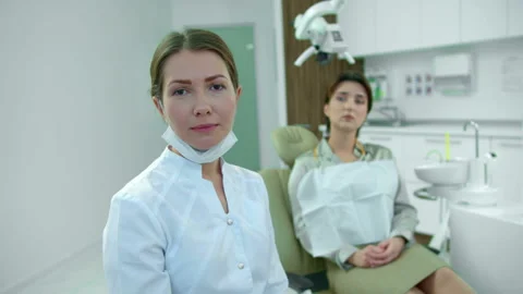 Dentist talks on camera in cabinet Stock Footage 120442817