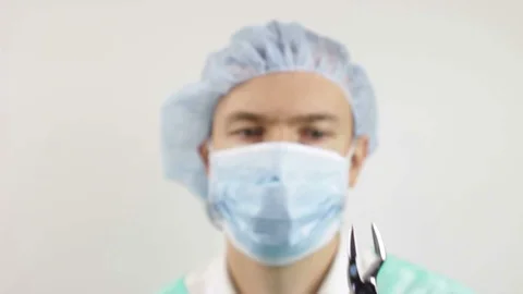Dentist with Teeth Pulling Tools Stock Footage 105055859