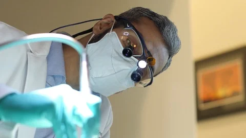 Dentist Tilting his Head Stock Footage 86579674