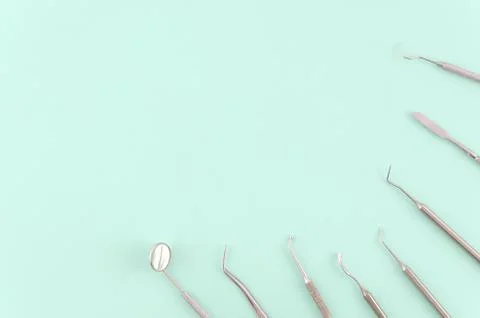 Dentist tools on color background, flat lay, top vipw. Stomatologist mock up Stock Photos