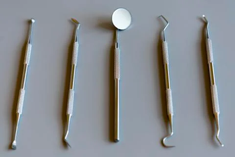Dentist tools on gray background. copy space Foto stock