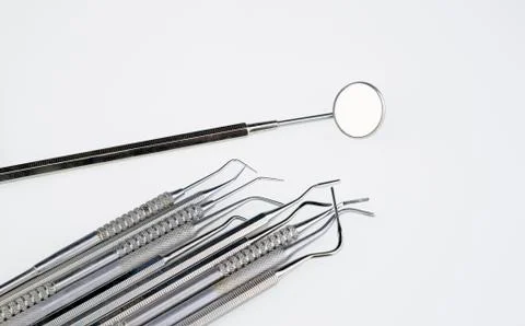 Dentist tools in a white background Stock Photos