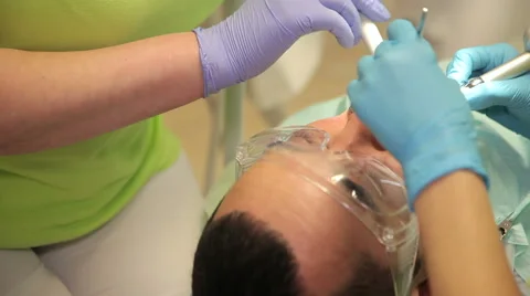 Dentist treats teeth Video stock 63315955