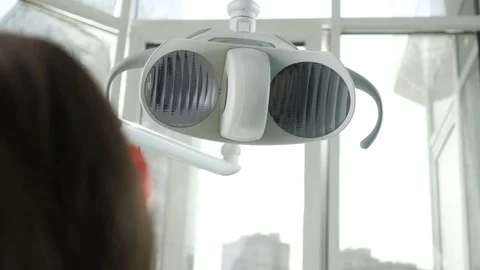 Dentist turns on the lamp Stock Footage 74583215