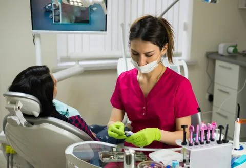 Dentist at work preparing instruments Stock Photos