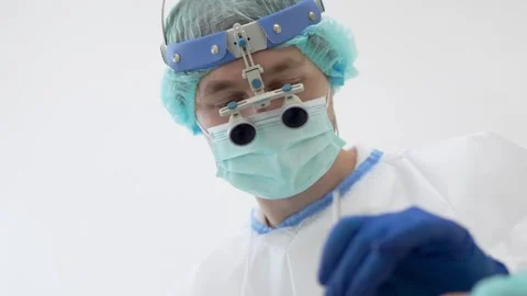 Dentist working with client in clinic Stock Footage 242154416
