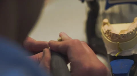 Dentist working with denture implants in laboratory.Close Up. Video stock 48921274
