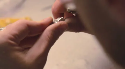 Dentist working with metal denture implants in laboratory. Close Up. Stock-Footage 48921378