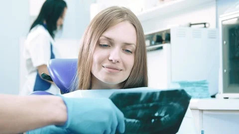 Dentist working with patient Stock Footage 91906330