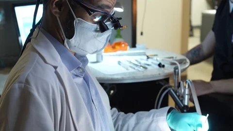 Dentist Working on Patient Medium Stock Footage 86579678