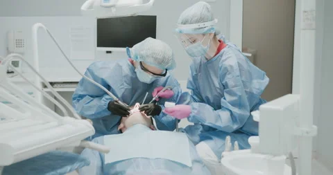 Dentistry. Surgical operation. Doctors. Stock Footage 140178287