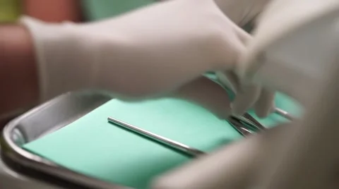 Dentists arranges tools Stock Footage 63612051