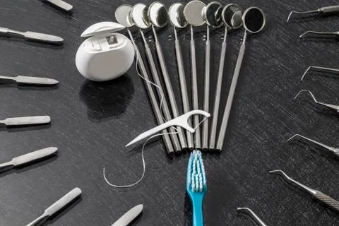 Dentist's instruments with shallow depth of field gray tinted Stock Photos