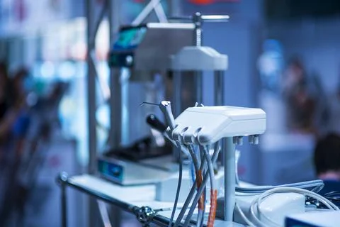 Dentist's instruments with shallow depth of field blue tinted Stock Photos
