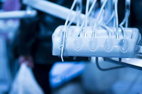 Dentist's instruments with shallow depth of field blue tinted Stock Photos