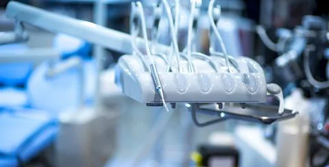 Dentist's instruments with shallow depth of field blue tinted Stock Photos