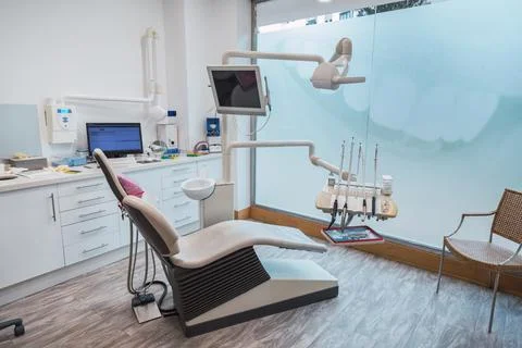 Dentist's office, operating table and tools. Stock Photos