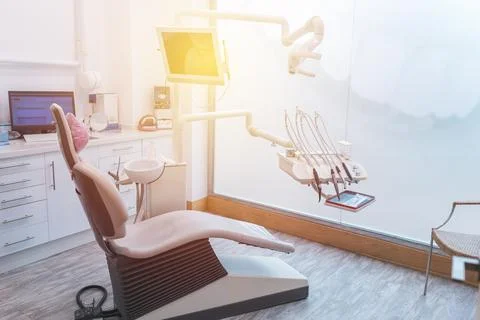 Dentist's office, operating table and tools. Stock Photos