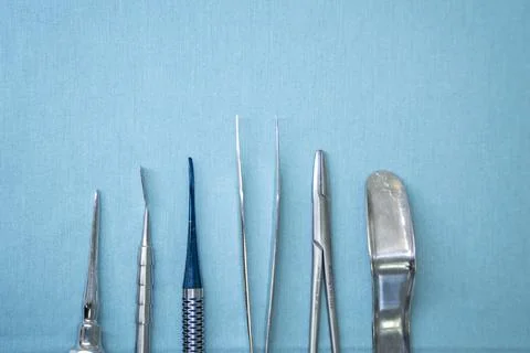 Dentist's tools on blue background Foto stock