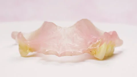 Dentures rotating false teeth rotating Stock Footage 334961193