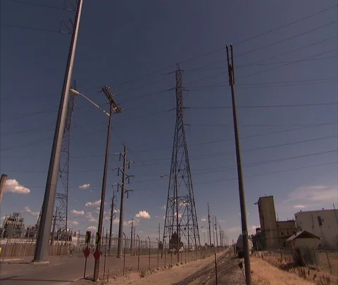 Denver, CO; WS Pan over transmission towers at Coal power station  Stock Footage 86692054