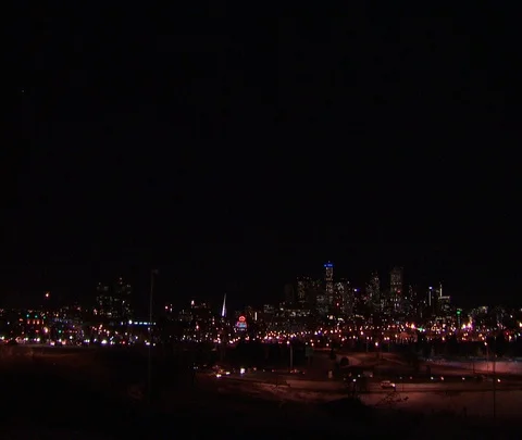 Denver, CO; XWS Night time Denver skyline with city lights and passing traffic Stock Footage 86748015