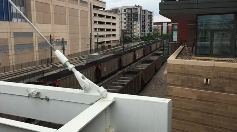 DENVER-JUNE 2015: An empty coal train runs through the city of Denver, Colorado. Stock Footage 68509490
