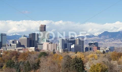 Denver Skyline and Rocky Mountains Stock Photos