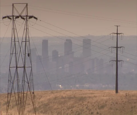 Denver skyline seen through haze and power lines Stock Footage 86691511